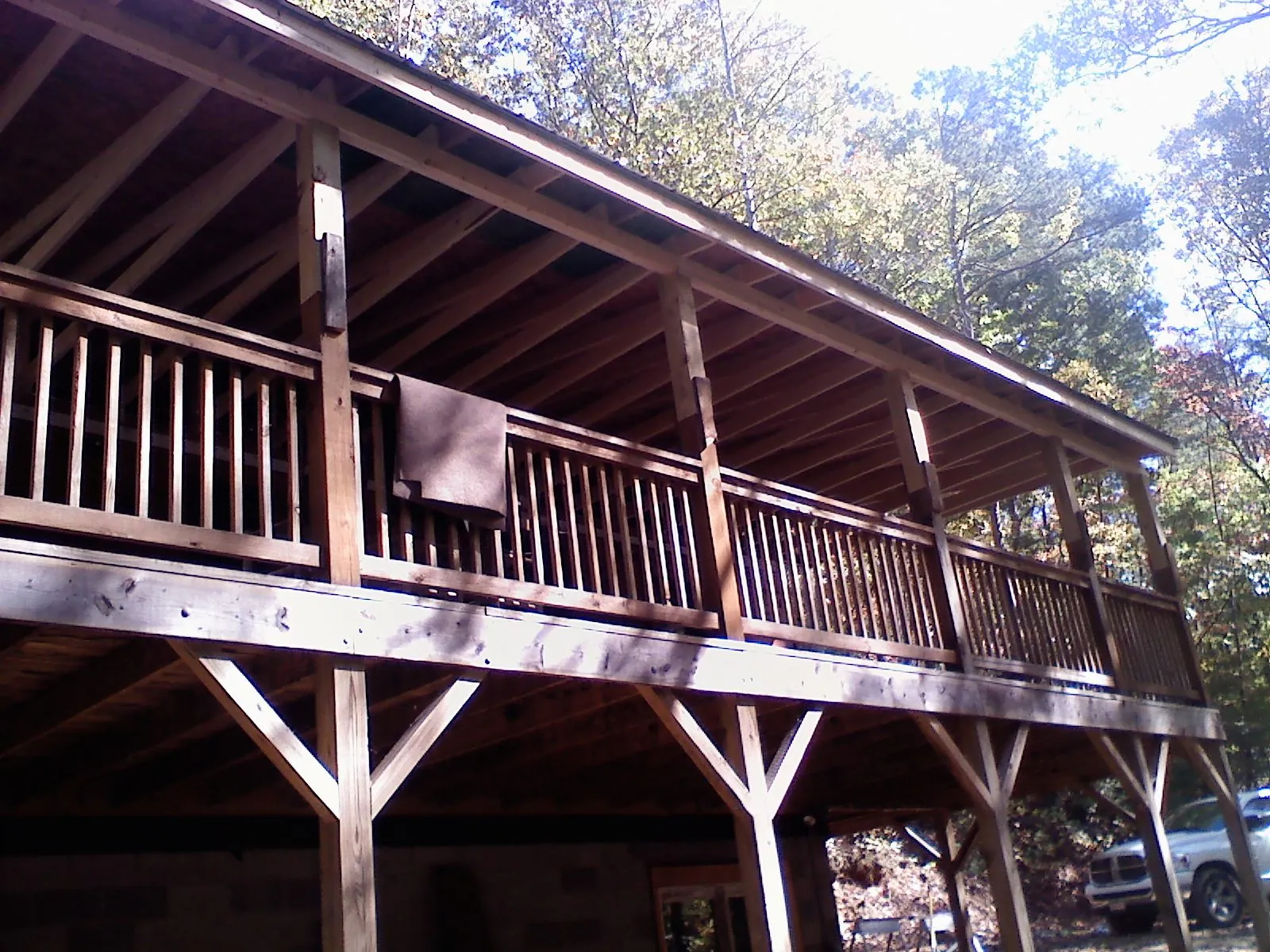 Timber framing under a new elevated porch and deck — Roof Leak Repair in Warrior by Roofing Brothers
